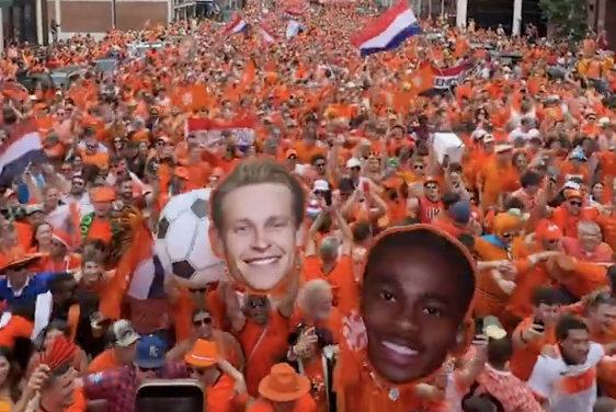 Oranje-fans gaan wereldwijd viraal: omstanders kijken hun ogen uit
